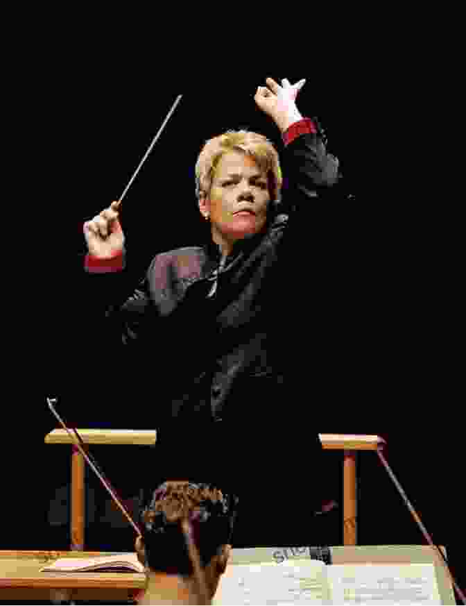 A Conductor Leading An Orchestra Playing The Music For The Ballet A Child S To The Nutcracker: The Story Music Costumes And Choreography Of The Fairy Tale Ballet (A Child S Series)