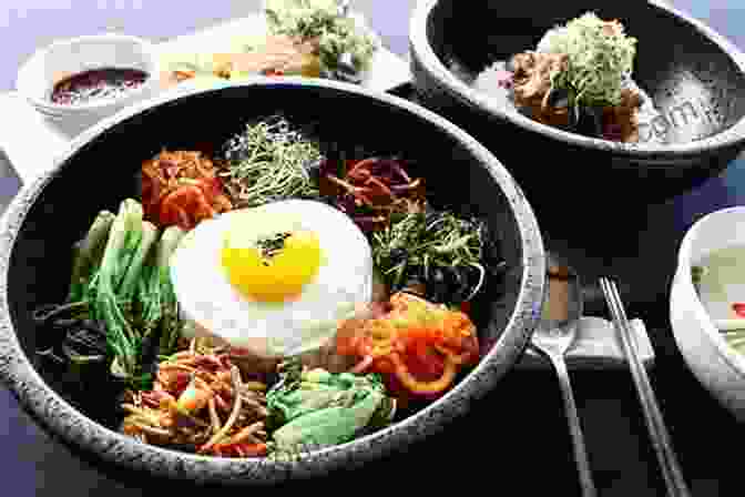 A Delectable Spread Of Korean Dishes, Including Bibimbap, Tteokbokki, And Kimchi, Highlighting The Vibrant Culinary Scene. Insight Guides South Korea (Travel Guide EBook)