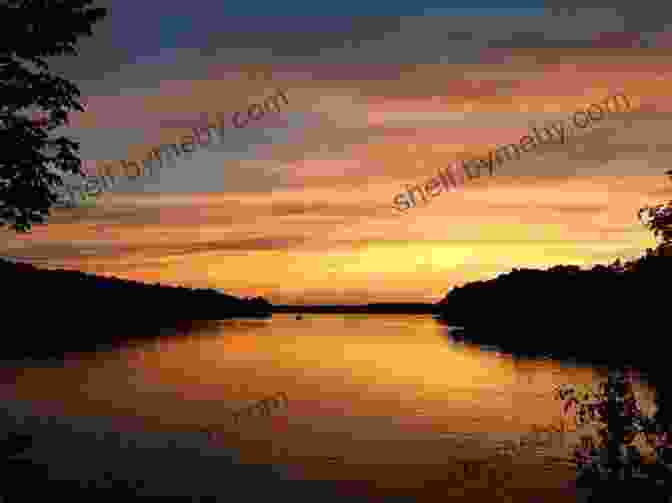 A Vibrant Orange And Purple Sunset Over Beaver Dam Lake. Sunsets Of Beaver Dam Wisconsin: One Of The Most Beautiful Secrets Of The World