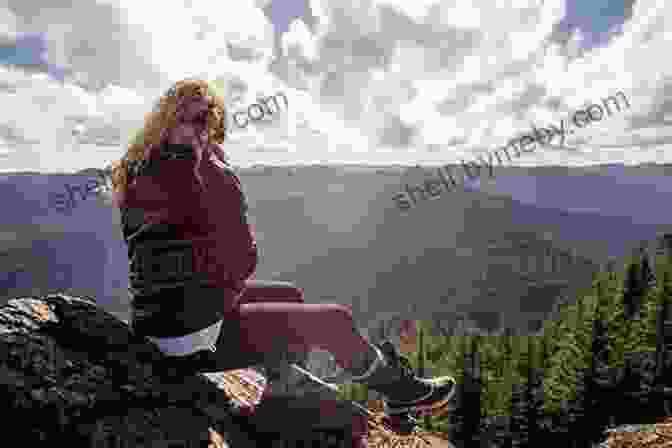 A Woman Sitting On A Rock, Looking Out At A Vast Wilderness Landscape. The Point Of Vanishing: A Memoir Of Two Years In Solitude