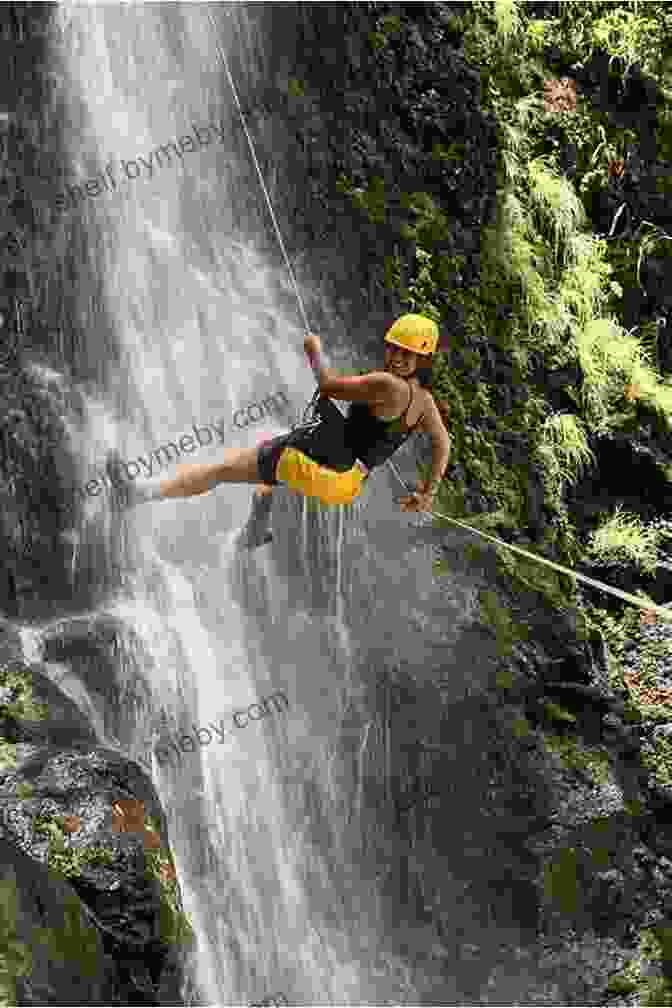 Adventurers Navigate A Wet Canyon, Rappelling Down A Waterfall. Canyoneering 2nd: A Guide To Techniques For Wet And Dry Canyons (How To Climb Series)