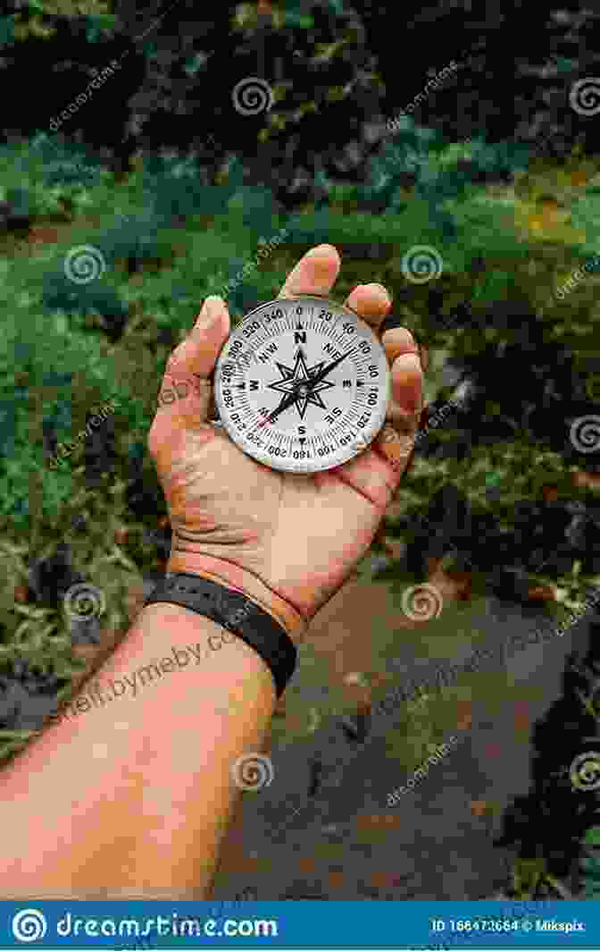 Explorer Holding A Compass Looking Into The Distance Hernan Cortes: A Life From Beginning To End (Biographies Of Explorers)